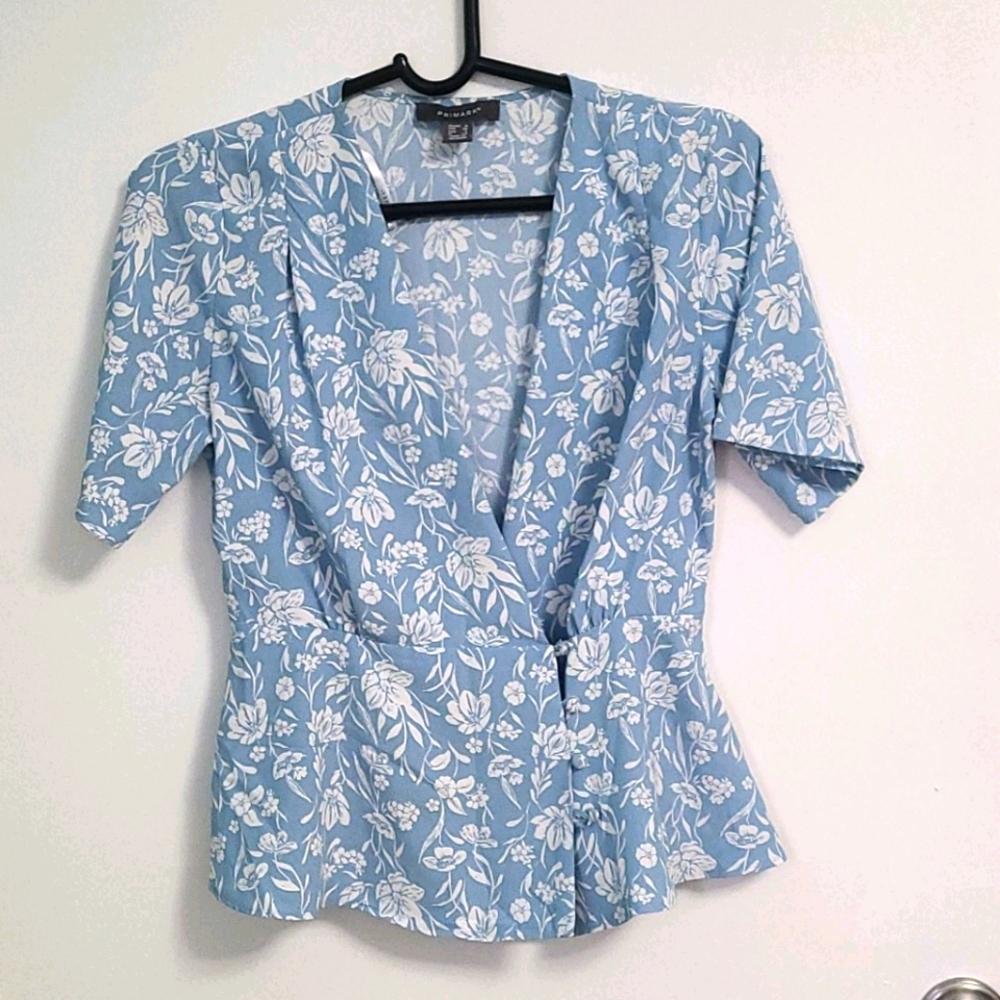 Blue and white wrap blouse